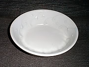 white porcelain oval bowl with trailing slip decoration